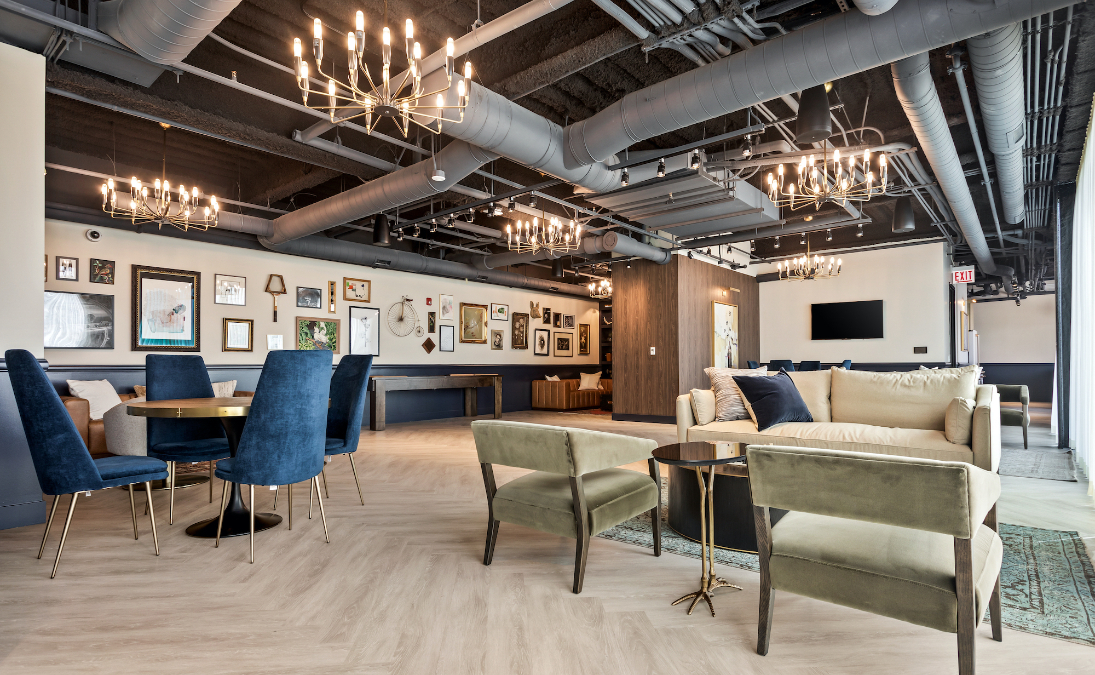 Resident clubroom at Logan Apartments in Logan Square Chicago with upscale lounge seating and modern design