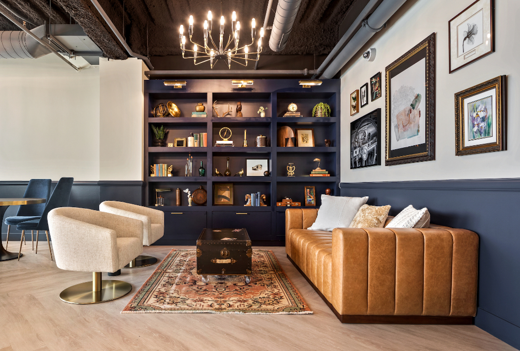 Resident clubroom at Logan Apartments in Logan Square Chicago with upscale lounge seating and modern design