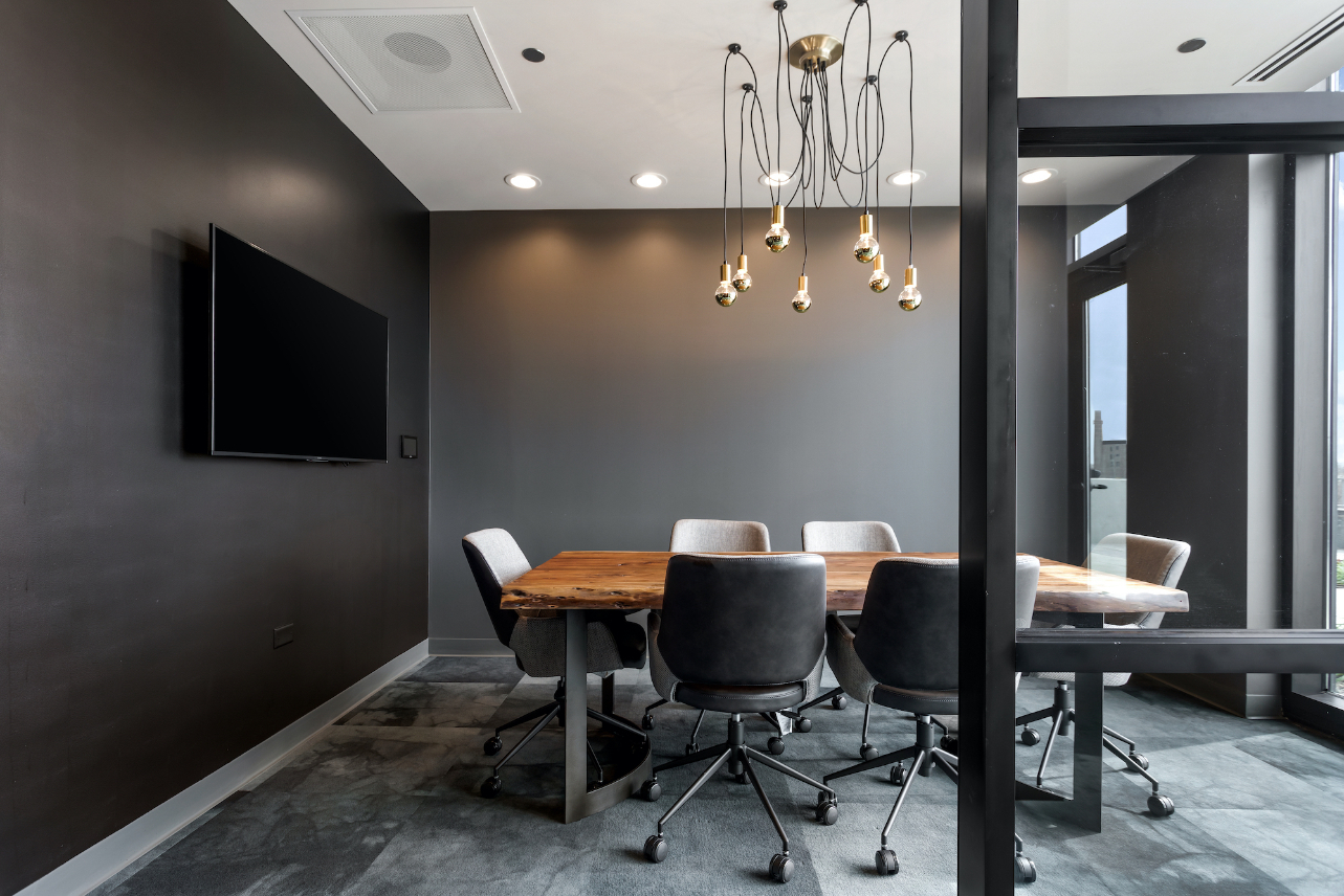 Co-working lounge at Logan Apartments in Logan Square Chicago with comfortable workspace and natural light