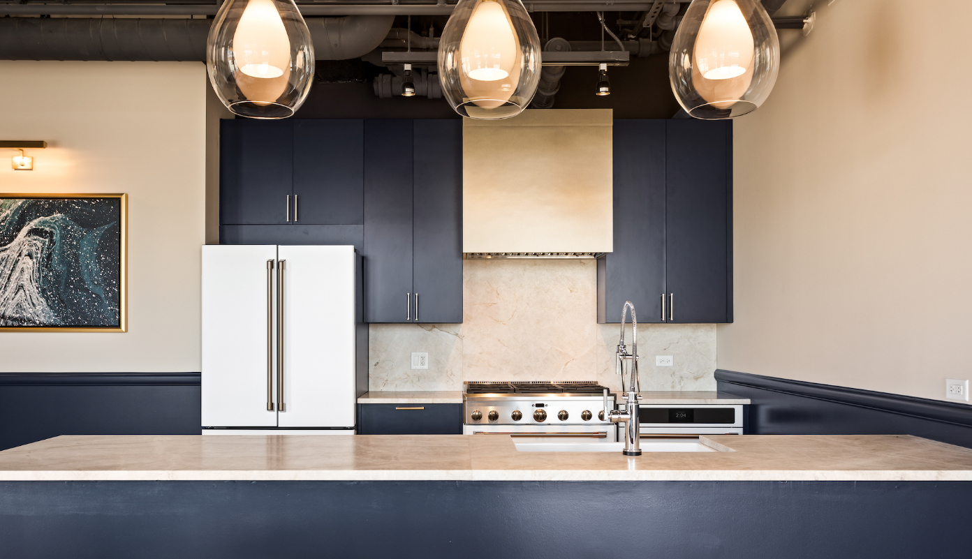 Demonstration kitchen at Logan Apartments in Logan Square Chicago with high-end appliances and finishes