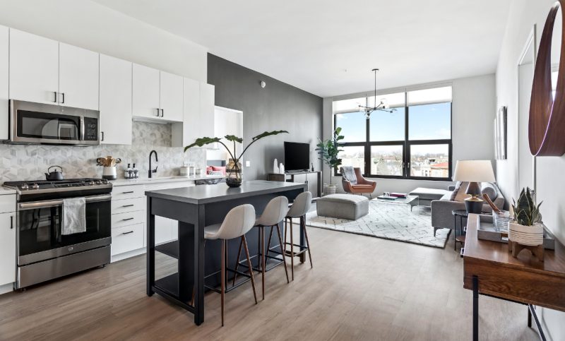 Demonstration kitchen at Logan Apartments in Logan Square Chicago with high-end appliances and finishes