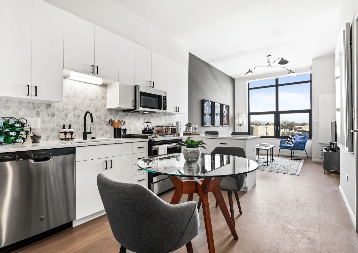 Demonstration kitchen at Logan Apartments in Logan Square Chicago with high-end appliances and finishes